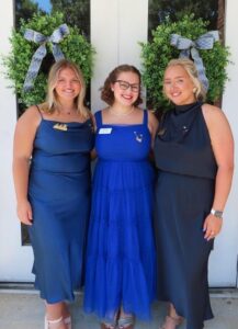 Chapter Support Coordinator, Ella Casto-Waters pictured with two Epsilon Tau - Middle Tennessee State University chapter members.